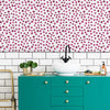 Bathroom Sink with Paint Spotted Wallpaper